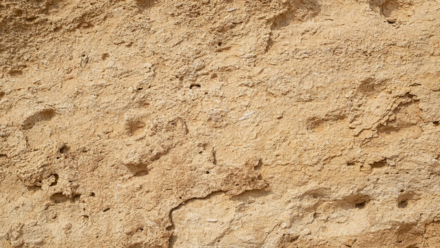 Natural texture sandstone, sun lighting, stone background