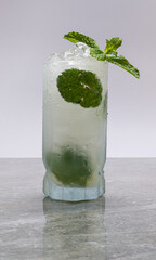 Traditional Brazilian Capirinha served chilled on a gray marble stone