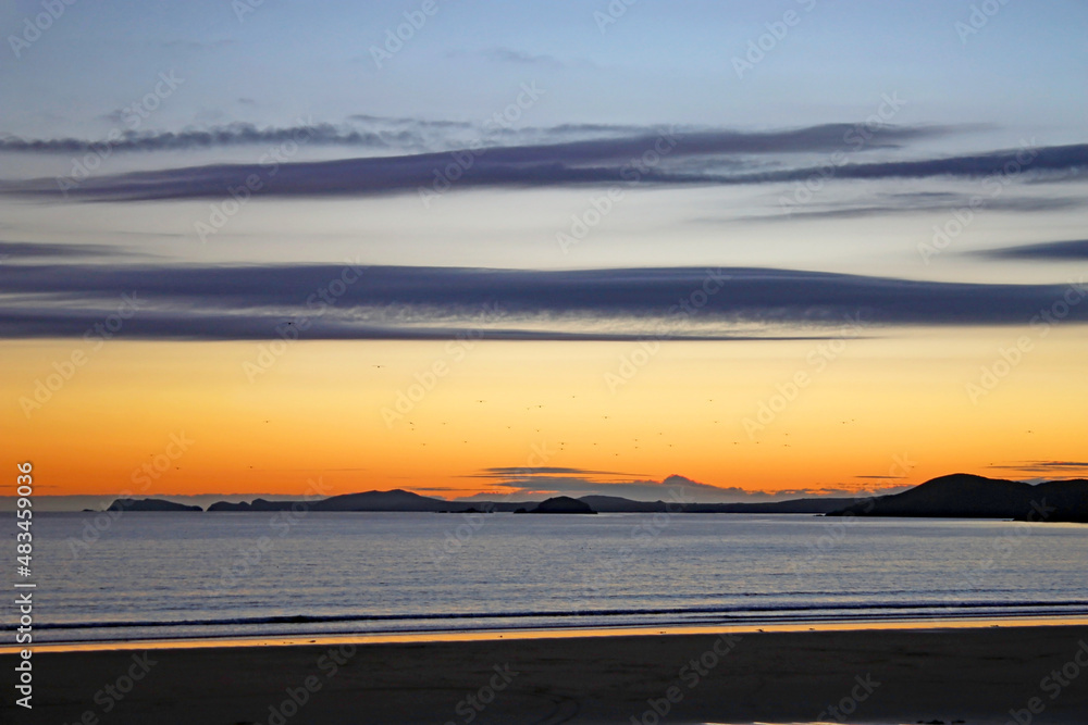 Poster sunset over newgale beach, wales