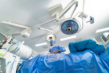 Surgical room in hospital with robotic technology equipment, machine arm neurosurgeon. Closeup of...