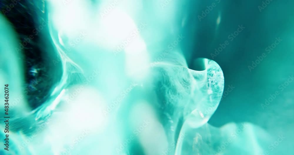 Poster abstract turquoise background with bubbles and particles. blue defocused, soft blur and bokeh backdr
