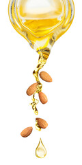 Pouring organic almond oil from glass pitcher and falling nuts on white background. Vertical banner...