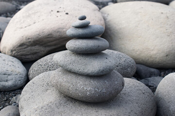 Fototapeta na wymiar Zen Stone pile at a stone beach