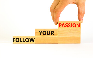 Follow your passion symbol. Concept words Follow your passion on blocks on beautiful white table white background. Businessman hand. Business, motivation and follow your passion concept. Copy space.