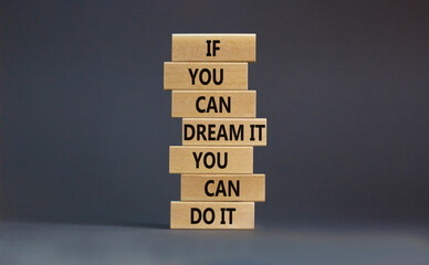 Dream and do it symbol. Wooden blocks with words If you can dream it you can do it. Beautiful grey...