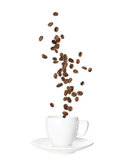 Aromatic roasted coffee beans falling into cup on white background