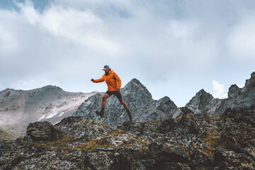 Man athlete trail running outdoor in mountains travel hiking adventure hobby skyrunning sport...