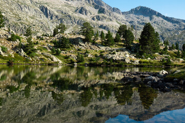 Naklejka na ściany i meble Mountain landscape in the Pyrenees. Mountain lake. Spanish Pyrenees.