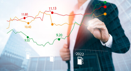 Oil energy graph of the world market, impact on the economy concept,Businessman touch chart with the indicator on the oil price slide at gas station, fluctuations in oil prices and exchange trade.