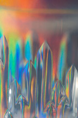 Abstract blurred background with light leaks and reflections.