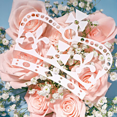 Creative british style background with flowers and paper silhouette of the british royal crown