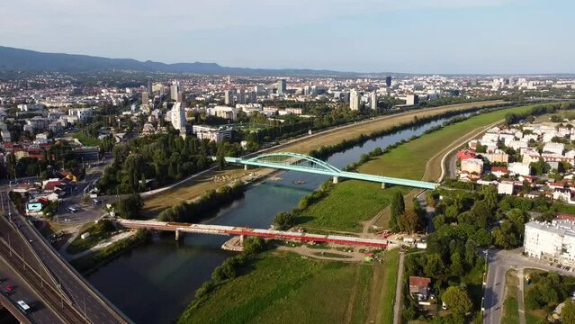 View of the bridges over the Sava river. Adriatic bridge (Jadranski most) then Savski most and The Hendrix Bridge. Сity panorama of Zagreb. Drone Video. Croatia. Europe