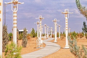 Path and lights in new park in desert , Ashgabat , Turkmenistan