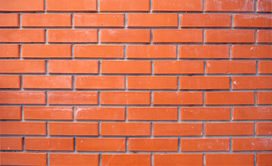Red brick wall. Texture of old brown and red brick wall backgorund. Background of wall with red bricks. Grunge dark orange background. close-up.