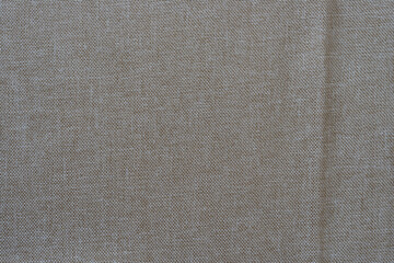 fabric background with a slight fold or crease mark