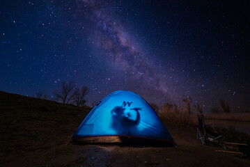 camping in the night and drink