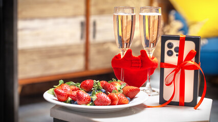 Blurred Valentine's Day composition with 13 iPhone strawberries red hearts