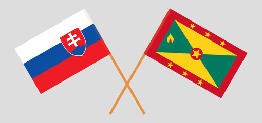 Crossed flags of Slovakia and Grenada. Official colors. Correct proportion
