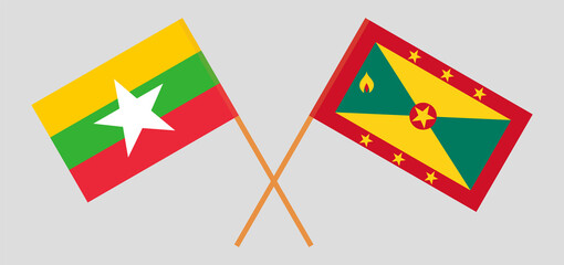 Crossed flags of Myanmar and Grenada. Official colors. Correct proportion