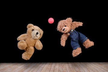 Teddy bears playing soccer