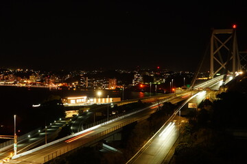 Fototapeta na wymiar Kanmon Bridge and city view of Moji retro town, in Fukuoka, Kitakyushu, Japan - 北九州 福岡県 門司港の街並み 関門橋