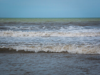 White Spume Known as Sea, Ocean or Beach Foam Created by the Agitation of Seawater in Palomino, Dibulla, La Guajira, Colombia