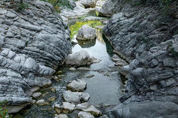 mountain landscape with a river in a rocky bed