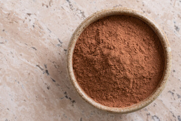 Obraz na płótnie Canvas Cocoa Powder in a Bowl