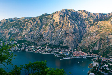 Fototapeta premium Beautiful view of Boka Kotorska Bay at sunset from Vrmac mountain. Adriatic Sea. Dalmatia. Balkan. Montenegro.
