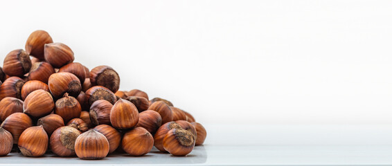 Hazelnuts in the shell. Round filbert, ripe fruit of a Corylus avellana hazel shrubs.