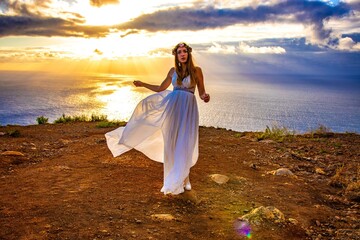 woman in a wedding dress in the mounatins from madeira portugal 