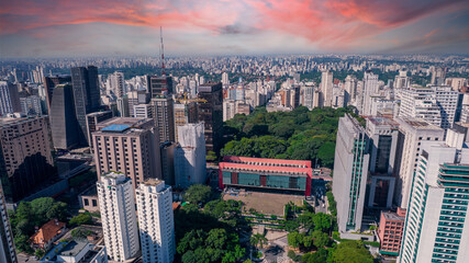 Aerial view of Av. Paulista in São Paulo, SP. Main avenue of the capital. With many radio antennas, commercial and residential buildings. Aerial view of the great city of São Paulo. Sunset