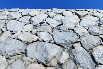 Stone wall with blue sky
