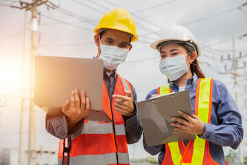 Team electrical engineer on site service outdoor, Teamwork success