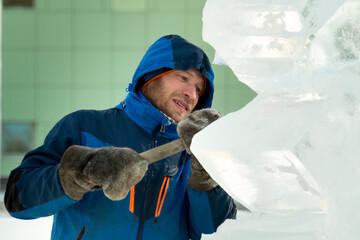 Portrait of a sculptor at work on a figure