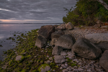 Evening at the Jasmunder Bodden coast on the pebble beach near Lietzow, Mecklenburg-Western Pomerania, Germany