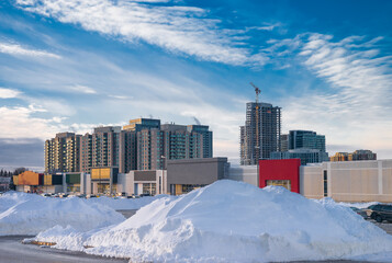 Snowy hills in a modern suburban Canadian city