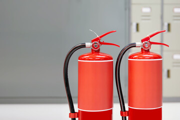 Fire extinguisher, Close-up red fire extinguishers tank in the building concepts of protection and...