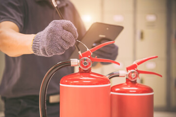 Fire extinguisher, Engineer inspection checking pressure gauge level fire extinguishers tank for...