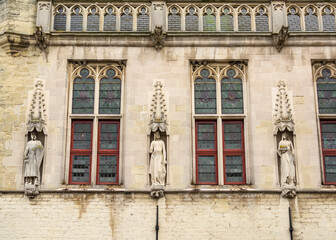 Obraz premium Architectural details of the Town hall of Damme, A municipality located in the Belgian province of West Flanders, Belgium