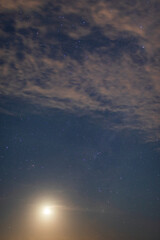 Starry night sky with moonlight.