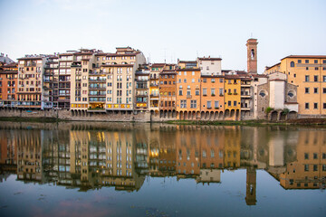 Fototapeta na wymiar Houses along the Arno River, in Florence, Italy