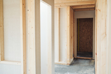 Interior passage in a timber home under construction