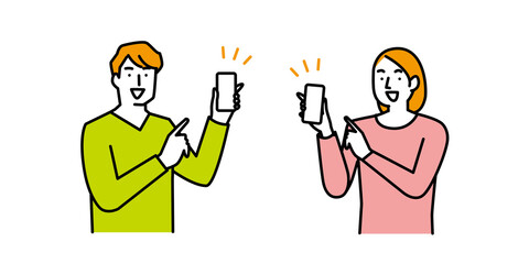 スマートフォンを指差す笑顔の男性と女性