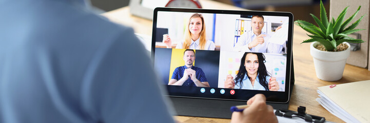 Head of the company conducts online meeting with employees via video call