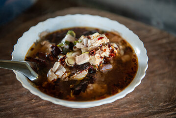 Hot and sour meat soup (Tom Yum) pork or chicken