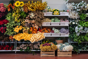 wall with shelves of flowers