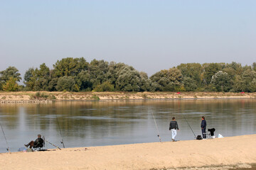 Fototapeta na wymiar Anglers on the Vistula River, near Karczew, Poland, Europe