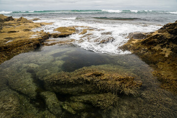 waves crashing on rocks