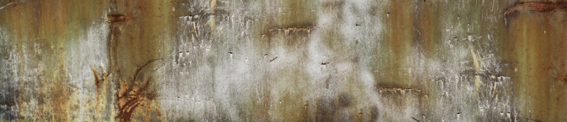 Rust texture backdrop. Scratched painted rusty metal surface. Old iron grunge background with copy space for design. Web banner. Website header. Panoramic.